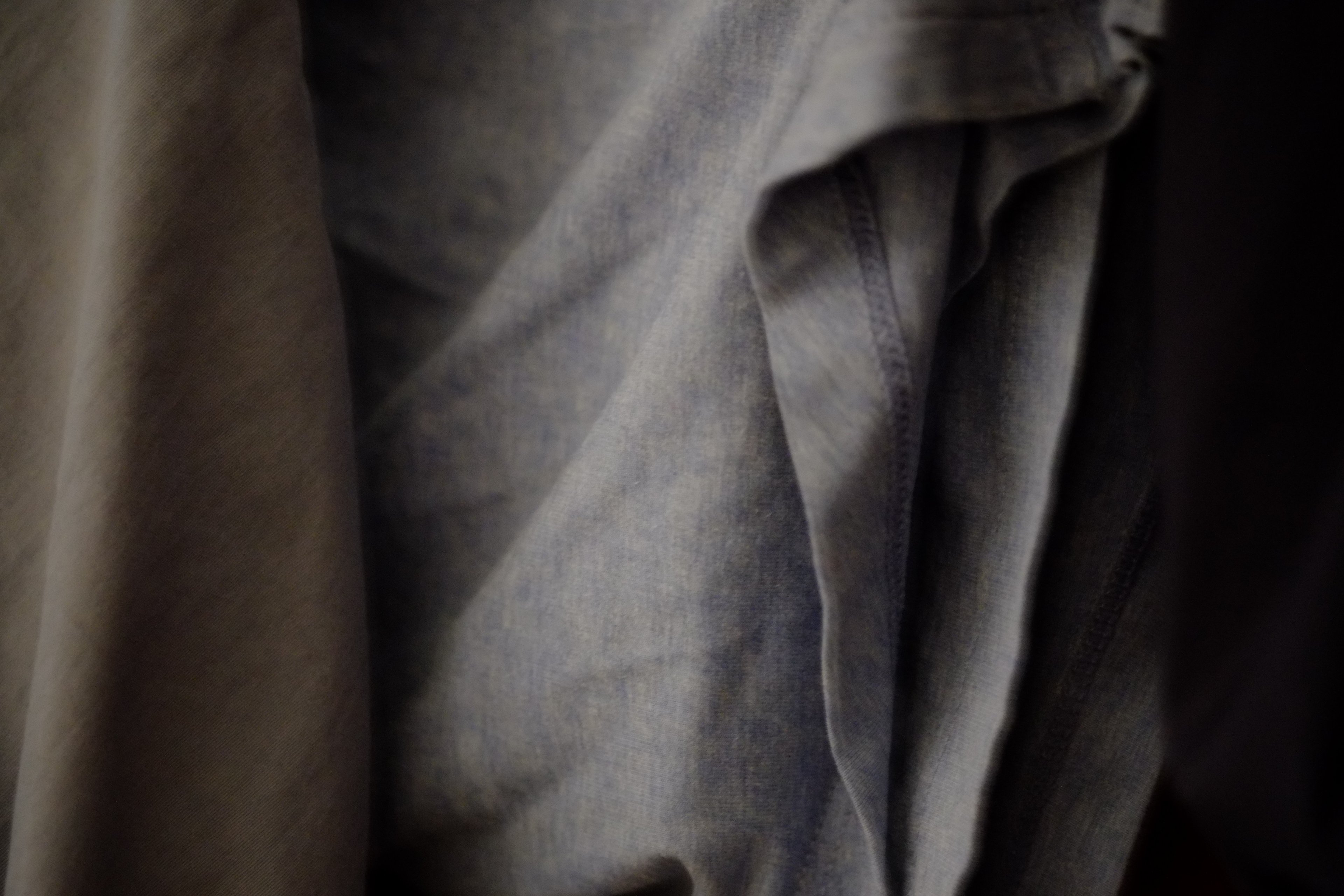 Folded grey cloth in low light