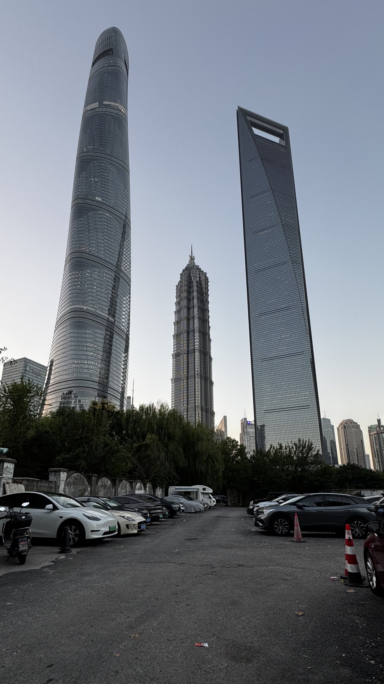 Shanghai Tower, Jin Mao and the World Financial Centre from a car park below