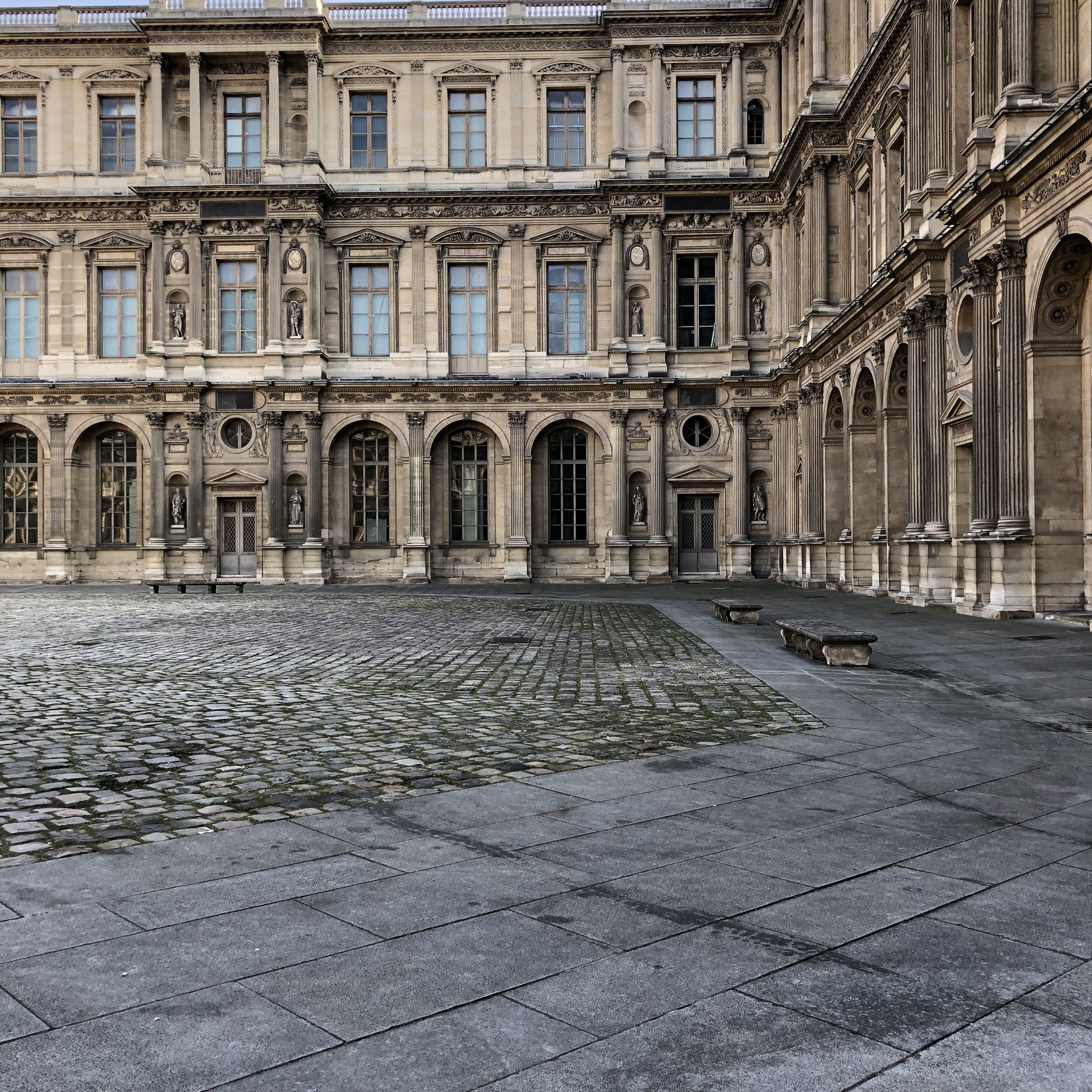 The Louvre's Cour Carrée empty in the early morning